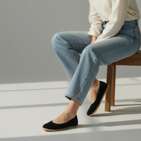 Person wearing black flats